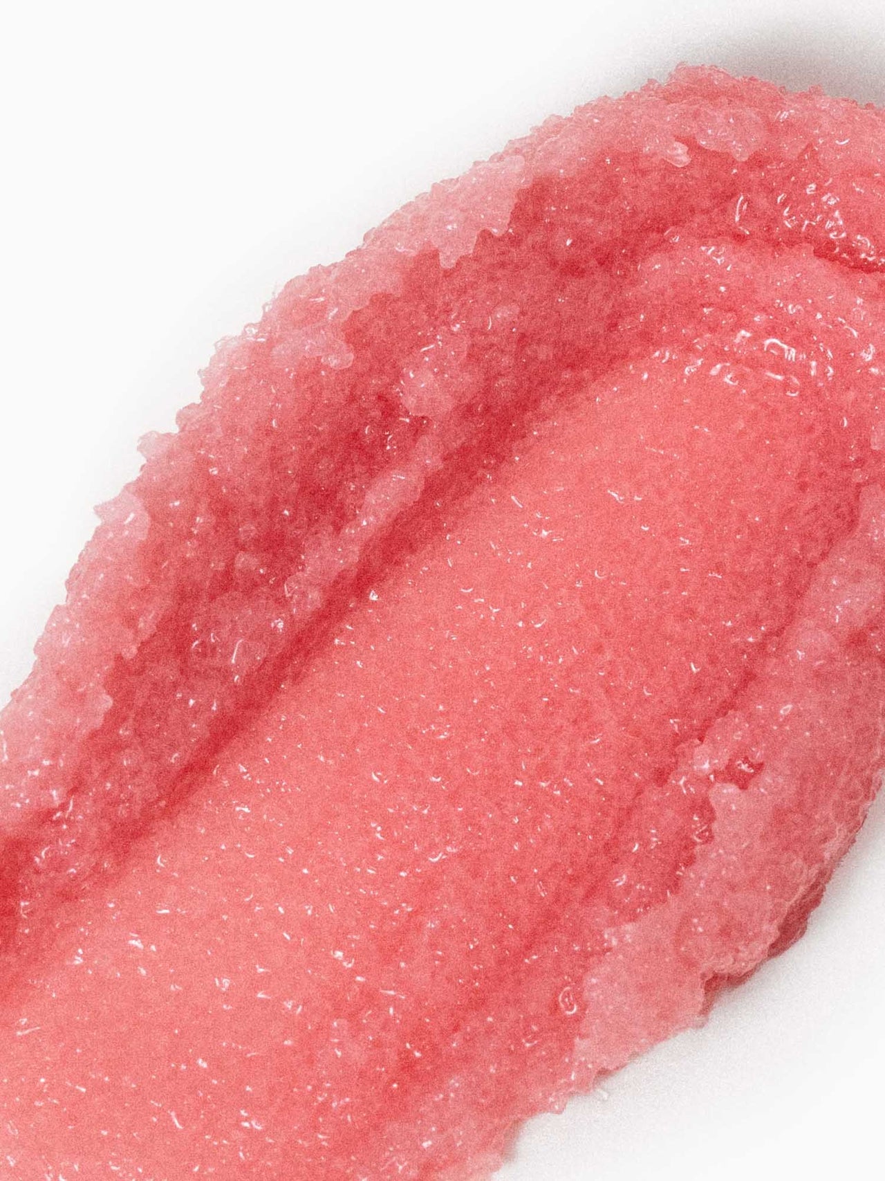 Lip Scrub von PURELEI, sanftes rosa Zuckerpeeling mit Traubenkernöl für weiche, gepflegte Lippen in tropischer Ästhetik