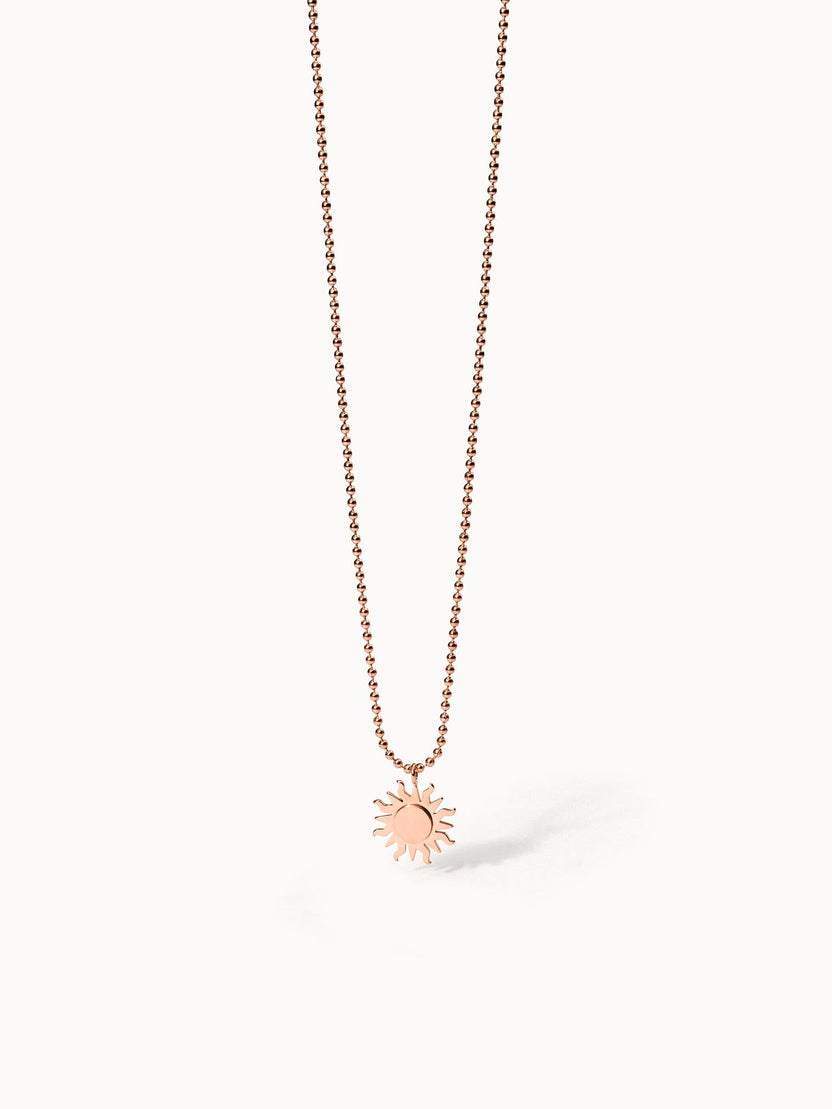 Roségoldene Kette mit Sonnenanhänger, PURELEI, elegant und strahlend.