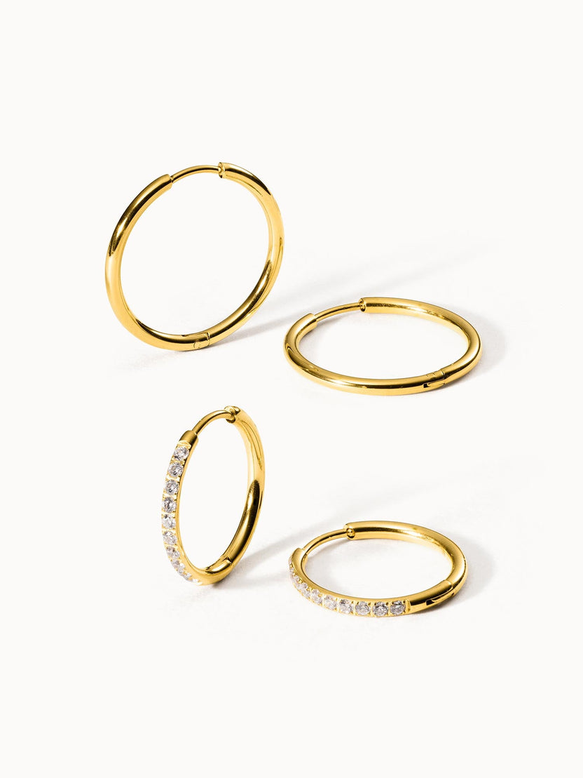 Goldene Creolen mit funkelnden Steinen, PURELEI, elegant und feminin.