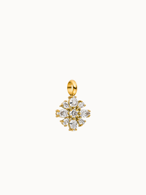 Blossom Charm von PURELEI, goldener Edelstahl mit funkelnden Zirkonia in Blütenform, elegant und zeitlos.