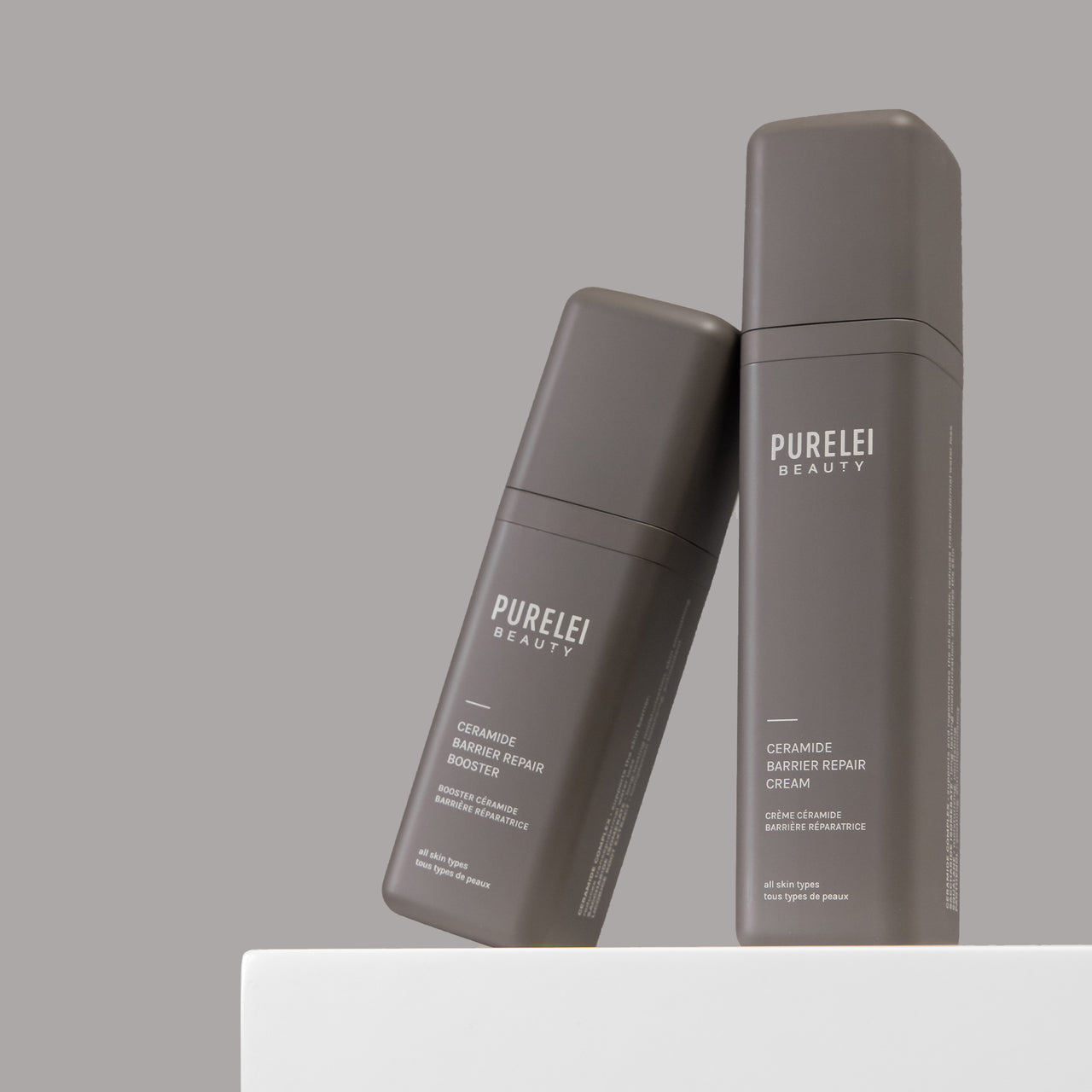 Barrier Repair Duo von PURELEI in minimalistischem Grau, für nachhaltige Hautpflege und Regeneration.