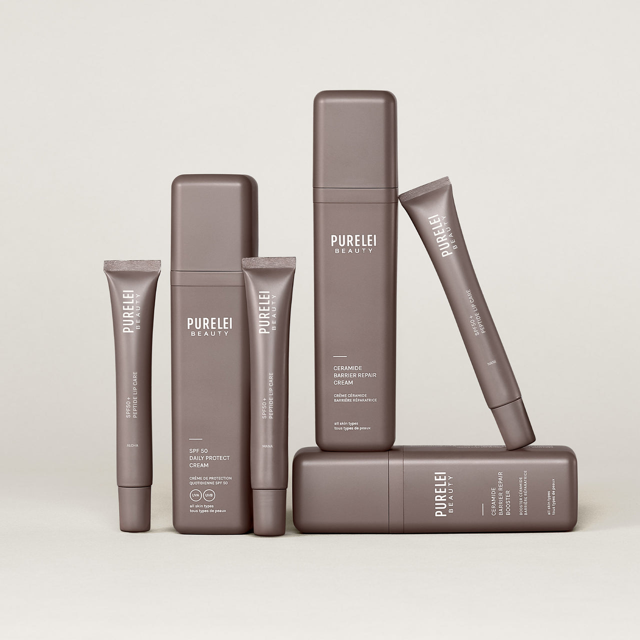PURELEI SPF50+ Peptide Lip Care in eleganten, braunen Tuben auf hellem Hintergrund, puristisch & hochwertig.