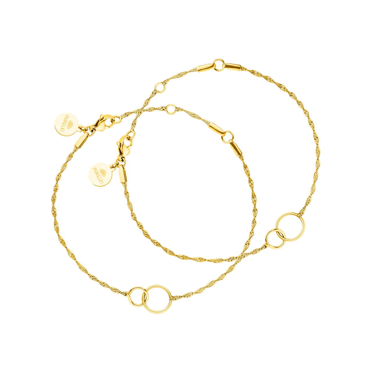 PURELEI Armband Set Kekahi mit zwei goldenen, ineinander greifenden Ringen und feiner Drehung, elegant und symbolisch.