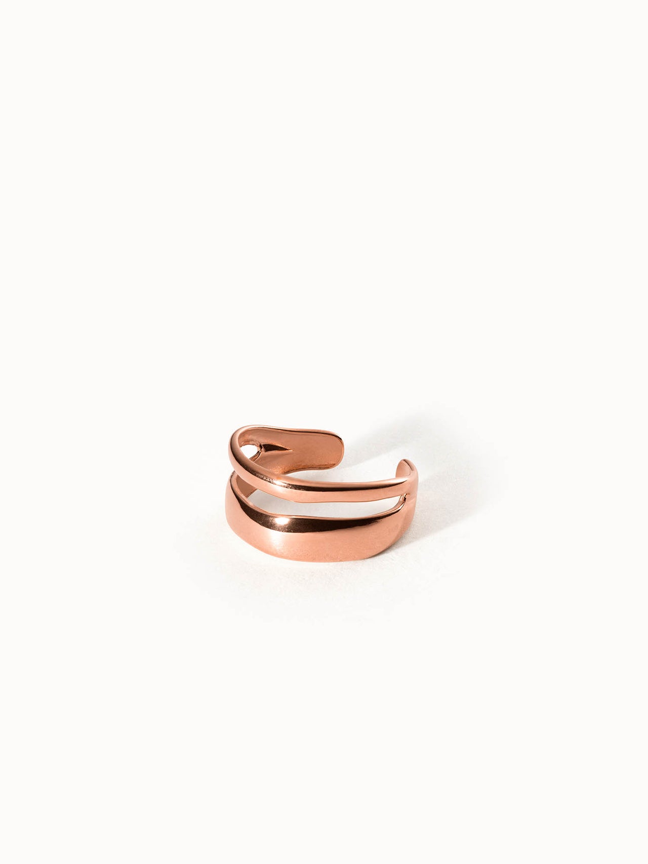 Verstellbarer PURELEI Twin Tides Ring in Roségold mit zwei geschwungenen Bändern, elegant und feminin gestaltet.