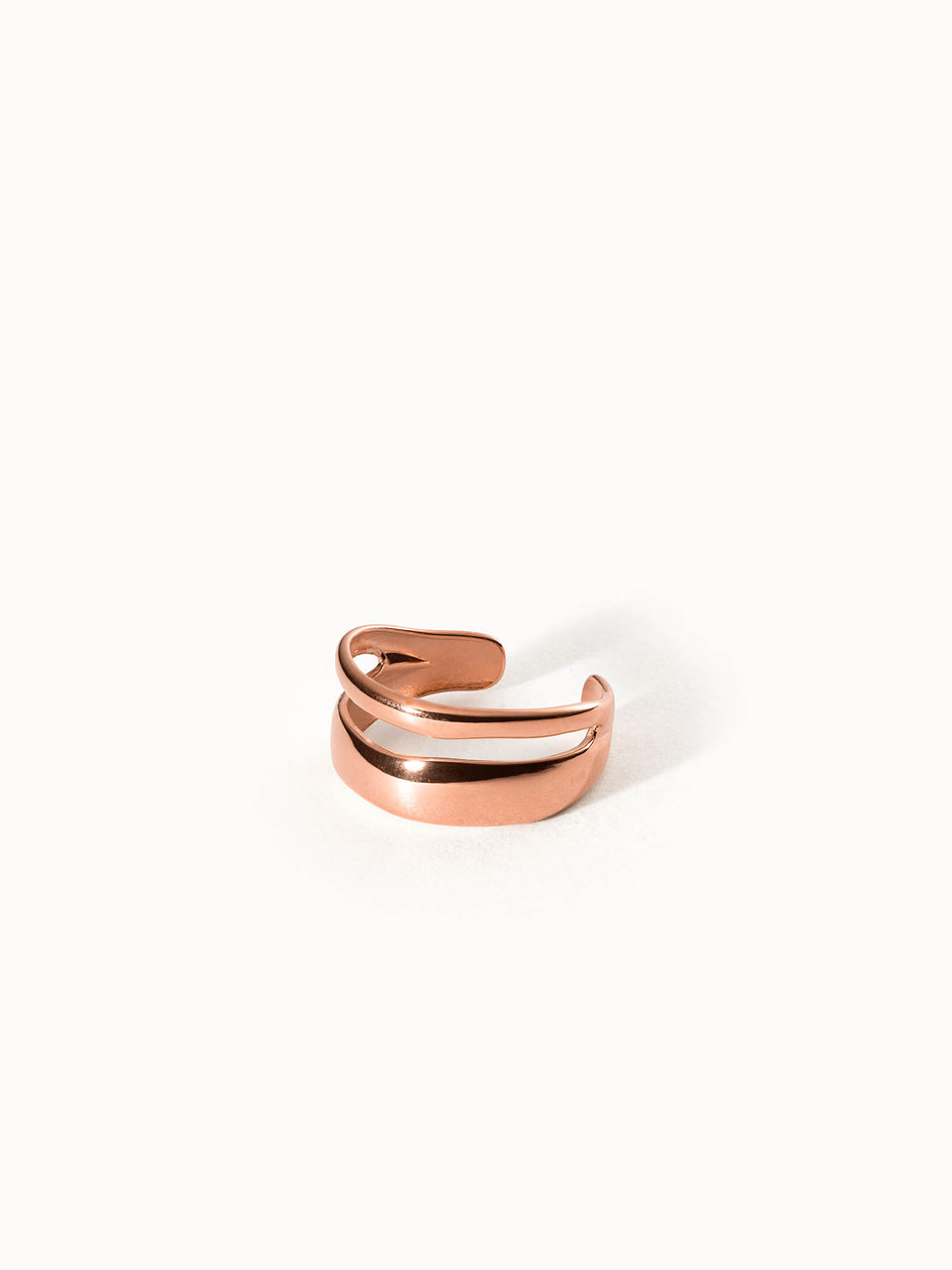 Verstellbarer PURELEI Twin Tides Ring in Roségold mit zwei geschwungenen Bändern, elegant und feminin gestaltet.