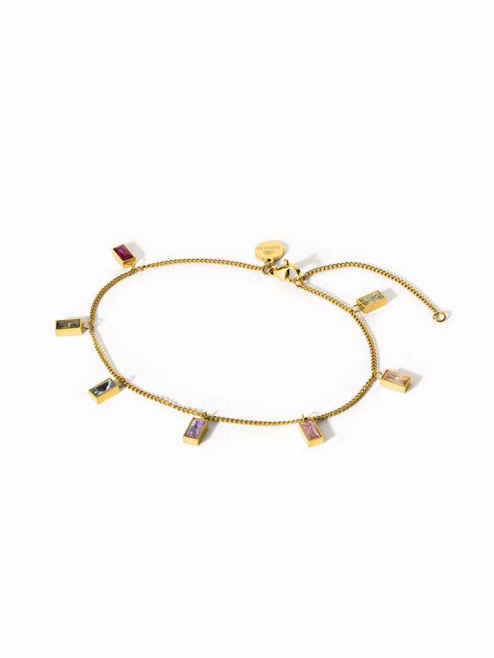 Rainbow Fusskettchen von PURELEI mit 18K vergoldetem Edelstahl und bunten Zirkonia-Steinen, elegant und lebensfroh.