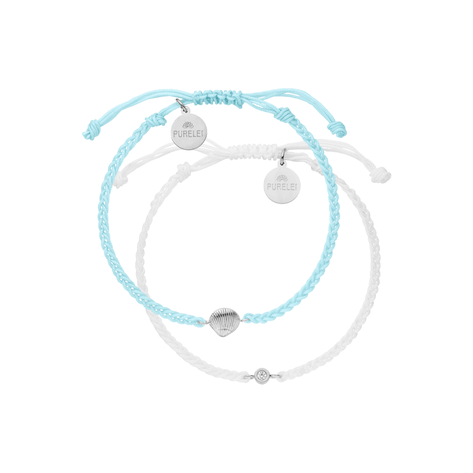 Blue Ocean Armband Set von PURELEI, geflochtene Armbänder in Türkis mit Muschel und Beige mit Schmuckstein, nickelfrei.