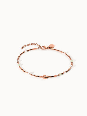 Roségoldenes Armband mit Perlen und zarten Details von PURELEI, elegant und feminin.