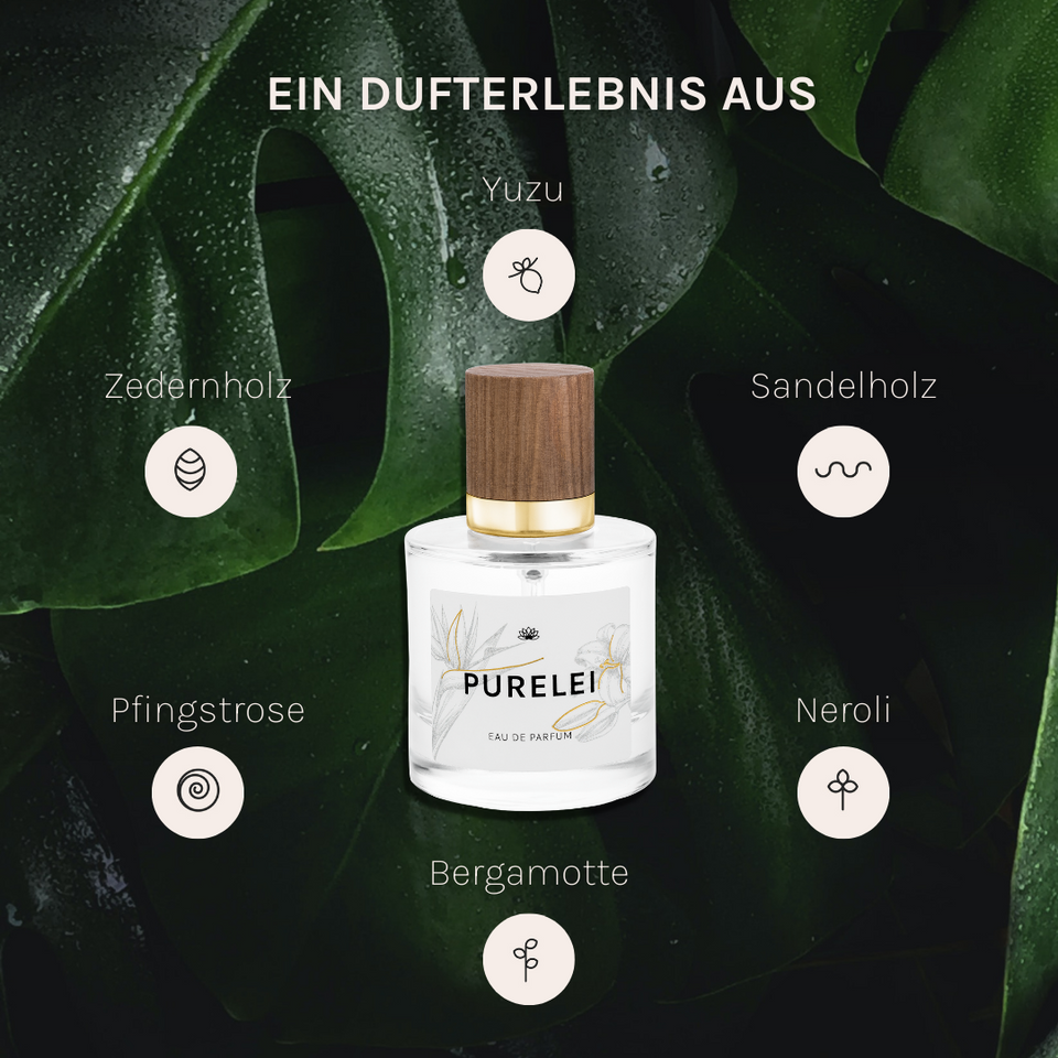 PURELEI Eau de Parfum 50ml mit holzig-blumigem Duft vor tropischem, grünem Blatt – elegant und natürlich.