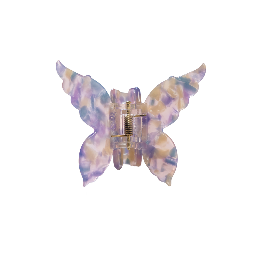 Transparente Haarklammer in Schmetterlingsform von PURELEI, lila und cremefarben mit marmoriertem Design.