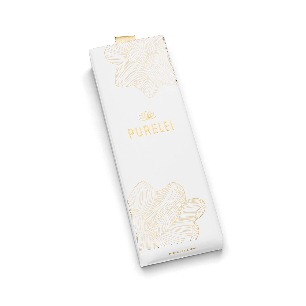 Makani Ketten-Set von PURELEI in Gold und Silber, edle Verpackung mit zarten floralen Akzenten, elegante Geschenkbox.